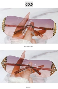 Detail of Y2K rimless sunglasses with gradient lenses and rhinestone-encrusted gold hinges