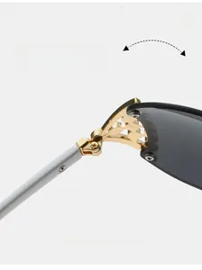 Detail of golden hollow metal hinge on Y2K rimless sunglasses with white temples
