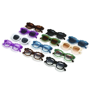 Women's stylish scalloped wavy frame sunglasses in multiple colors and lens options