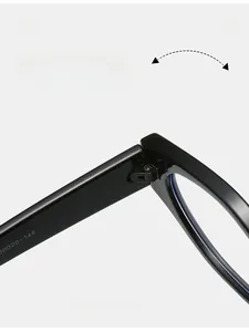 Macro detail of a durable metal hinge on vintage cat-eye glasses with sizing text
