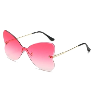 Frameless butterfly sunglasses with pink gradient lenses and gold metal frames