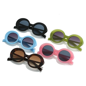 Collection of retro oval sunglasses in black, blue, pink, green, and tortoiseshell colors