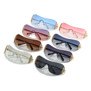 Y2K rimless sunglasses for women with luxury rhinestones and gradient lenses