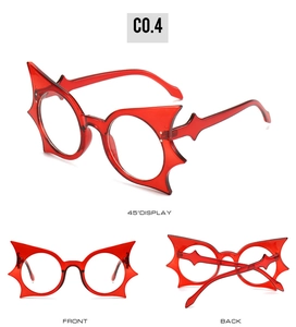Detailed views of translucent red bat wing glasses frames for trendy party and street style