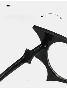 Detail shot of durable texture hinge on black bat-shaped avant-garde eyewear frames