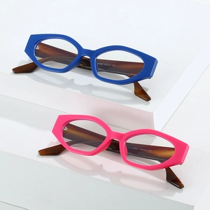 Modern cat eye thick frame glasses in vibrant blue and pink with tortoiseshell temples