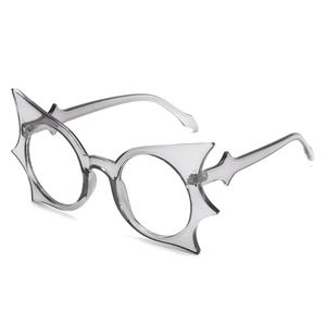 Oversized bat-shaped cat eye glasses frames in transparent smoke grey for street style