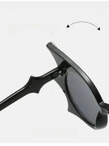Detail of durable textured hinge on oversized black butterfly frame sunglasses