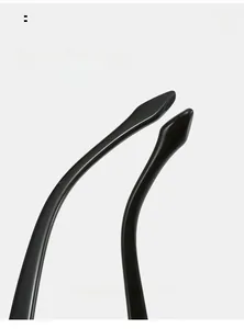 Detail view of smooth curved black sunglasses legs designed for comfortable wear