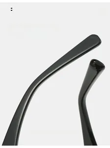 Detail showing curved mirror legs and arc design for comfortable wear on black sunglasses