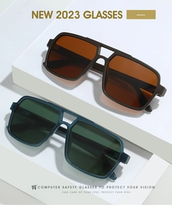 Detail view of large frame polarized sunglasses in deep brown and dark blue finishes