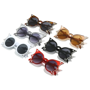 Cat eye batwing sunglasses set with rhinestone star accents in six various colors