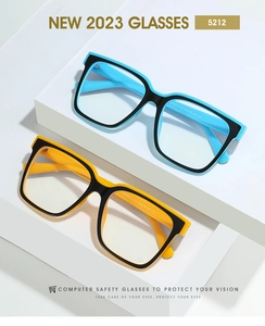 Detail of square TR90 anti-blue light glasses with stylish two-tone black and orange frames