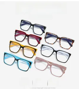 Flat lay of square TR90 anti-blue light glasses in multiple colors and patterns
