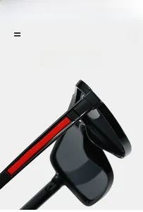 Detail of polarized sunglasses showing red anti-slip silicone temples and elastic frame