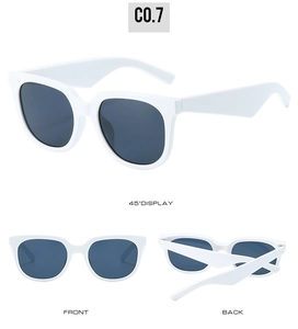 Front, back, and 45-degree views of oversized white sunglasses with dark grey lenses