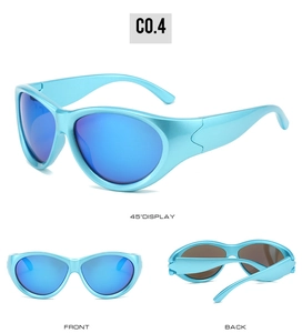 Detail view of blue oversized Y2K sports sunglasses with wrap-around frame and mirrored lenses