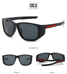 Detailed view of matte black polarized sports sunglasses with red temple accents