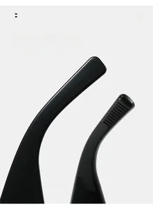Detail of curved ergonomic black sunglasses legs with anti-slip texture and high gloss finish