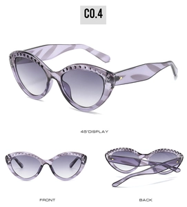 Three-way view of purple cat eye sunglasses with metal studs and gradient lenses