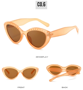 Detail of orange cat eye sunglasses with stud accents and brown UV lenses from three angles