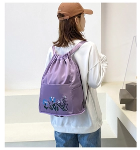 Detailed embroidery on purple waterproof oxford drawstring backpack for women