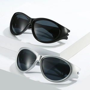 Y2K fashion sports sunglasses with large frames in black and metallic silver finishes