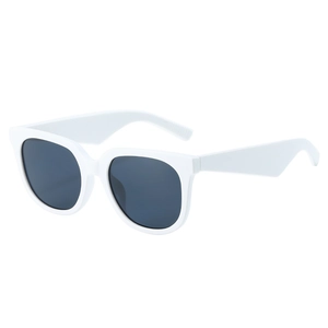 Chic white thick frame sunglasses with dark grey lenses in a 45-degree side view