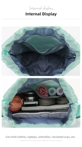 Detail view of large mint green drawstring backpack interior with wet dry storage capacity