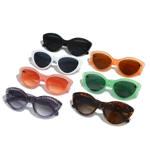 Stylish cat-eye sunglasses with studded frame decoration in multiple colors for women