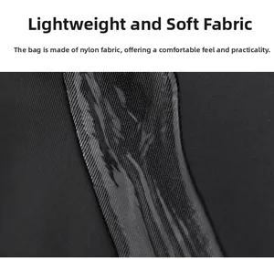 Detail of waterproof black nylon fabric texture on a large capacity travel backpack