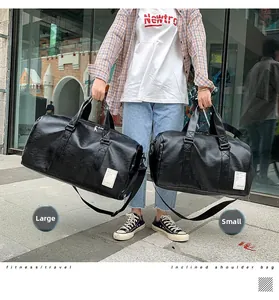 Comparison of large and small black faux leather travel bags in an outdoor street setting