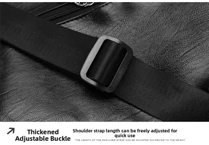 Detail of lychee pattern leather and frosted metal adjustment buckle on travel bag