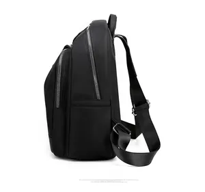Side view of black oxford backpack showing multi-layer zippers and side pocket
