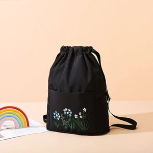 Black Oxford drawstring backpack with floral embroidery and waterproof nylon fabric