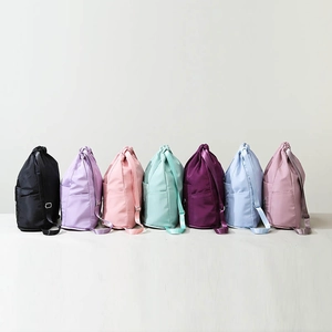Waterproof oxford fabric drawstring backpacks in seven vibrant colors for travel