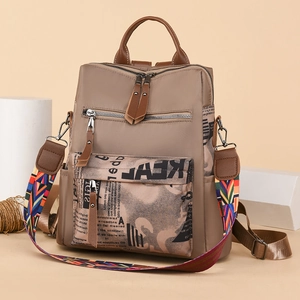 Fashionable Oxford cloth backpack for women with newspaper print and colorful strap