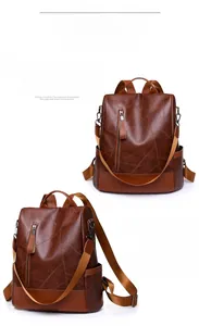 Detail of dark brown PU leather backpack with geometric stitching and side pockets