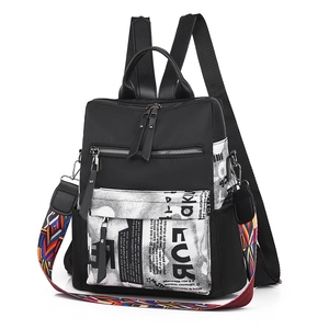 Oxford fabric backpack with stylish newspaper print pocket and colorful woven shoulder strap