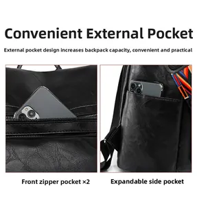 Detail of black faux leather backpack featuring front zippers and colorful woven strap