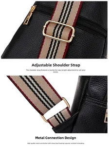 Detail of adjustable striped strap and gold hardware on black lychee texture PU chest bag