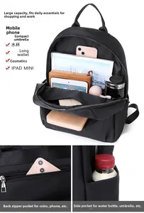 Détail du sac à dos en tissu Oxford montrant le grand intérieur et la poche antivol