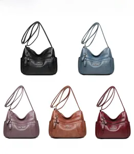 Display a colori di borse a tracolla in pelle PU con zip multiple in cinque tonalità