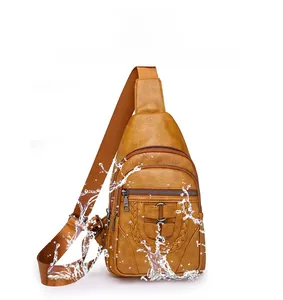 Detailed view of brown soft PU leather bag highlighting its water-resistant surface and texture