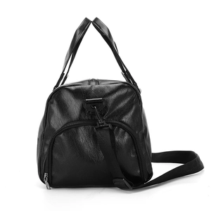 Classic black leather travel duffel bag with pebble texture and adjustable shoulder strap