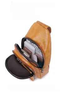 Detail view of large capacity yellow PU leather chest bag with multi-layer zippers