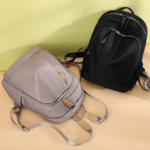 Minimalist Oxford fabric backpack in black and khaki colors for large capacity travel usage