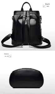 Detail view of the black leather backpack showing the padded back and wide flat bottom