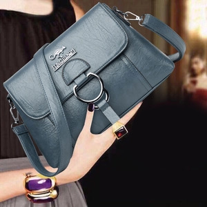 Minimalist soft PU leather shoulder bag in blue with metal ring and kangaroo logo