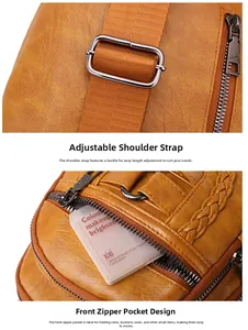 Detail of adjustable woven strap and front zipper pocket on brown PU leather chest bag
